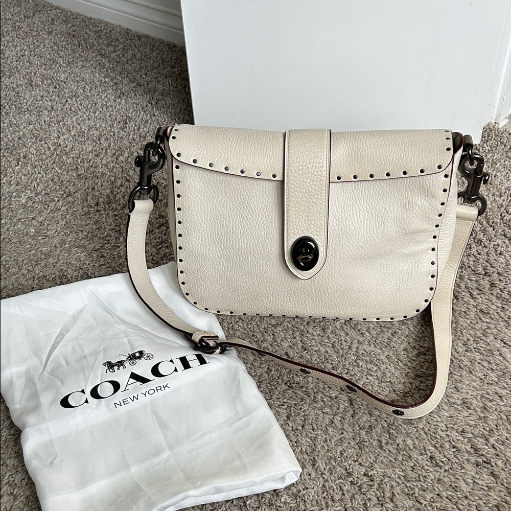 Coach Cream Page 27 with rivets bag